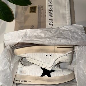 golden goose stardan black and white